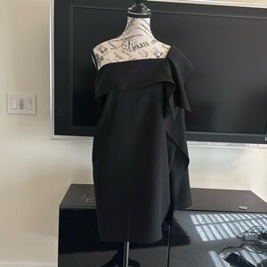 It’s a nice black long shirt can use off shoulder too for size it said P